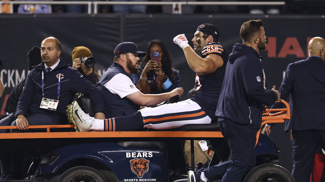 CHICAGO, ILLINOIS - OCTOBER 22: Cole Kmet #85 of the Chicago Bears is carted off the field after sustaining an injury during the fourth quarter of an NFL football game against the New England Patriots at Soldier Field on October 22, 2026 in Chicago, Illinois.