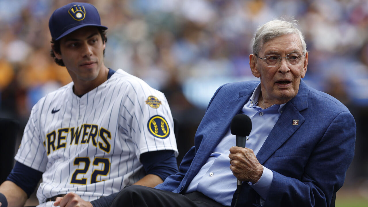 MILWAUKEE, WI - AUGUST 24: Milwaukee Brewers outfielder Christian Yelich (22) looks as Bud Selig answers a question during the Bob Uecker Celebration of Life ceremony at American Family Field, on August 24, 2025 in Milwaukee, WI.