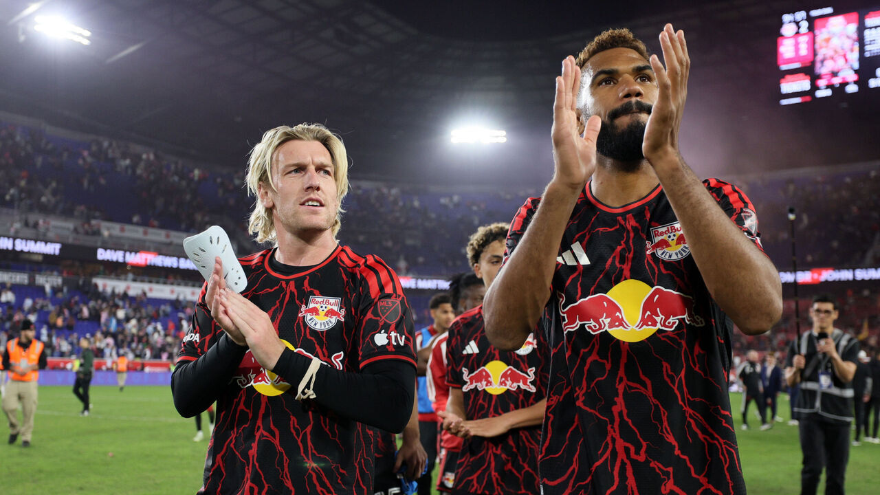 HARRISON, NEW JERSEY - OCTOBER 24: Emil Forsberg #10 and Eric Maxim Choupo-Moting #13 of Red Bull New York acknowledge the fans after winning the MLS match between Red Bull New York and Inter Miami CF at Sports Illustrated Stadium on October 24, 2026 in Harrison, New Jersey.