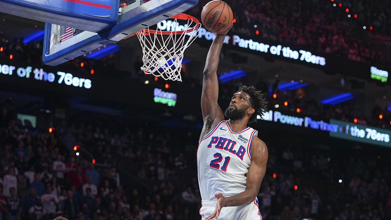 PHILADELPHIA, PENNSYLVANIA - OCTOBER 24: Joel Embiid #21 of the Philadelphia 76ers dunks the ball against the Milwaukee Bucks in the fourth quarter at Xfinity Mobile Arena on October 24, 2026 in Philadelphia, Pennsylvania. The 76ers defeated the Bucks 127-116.