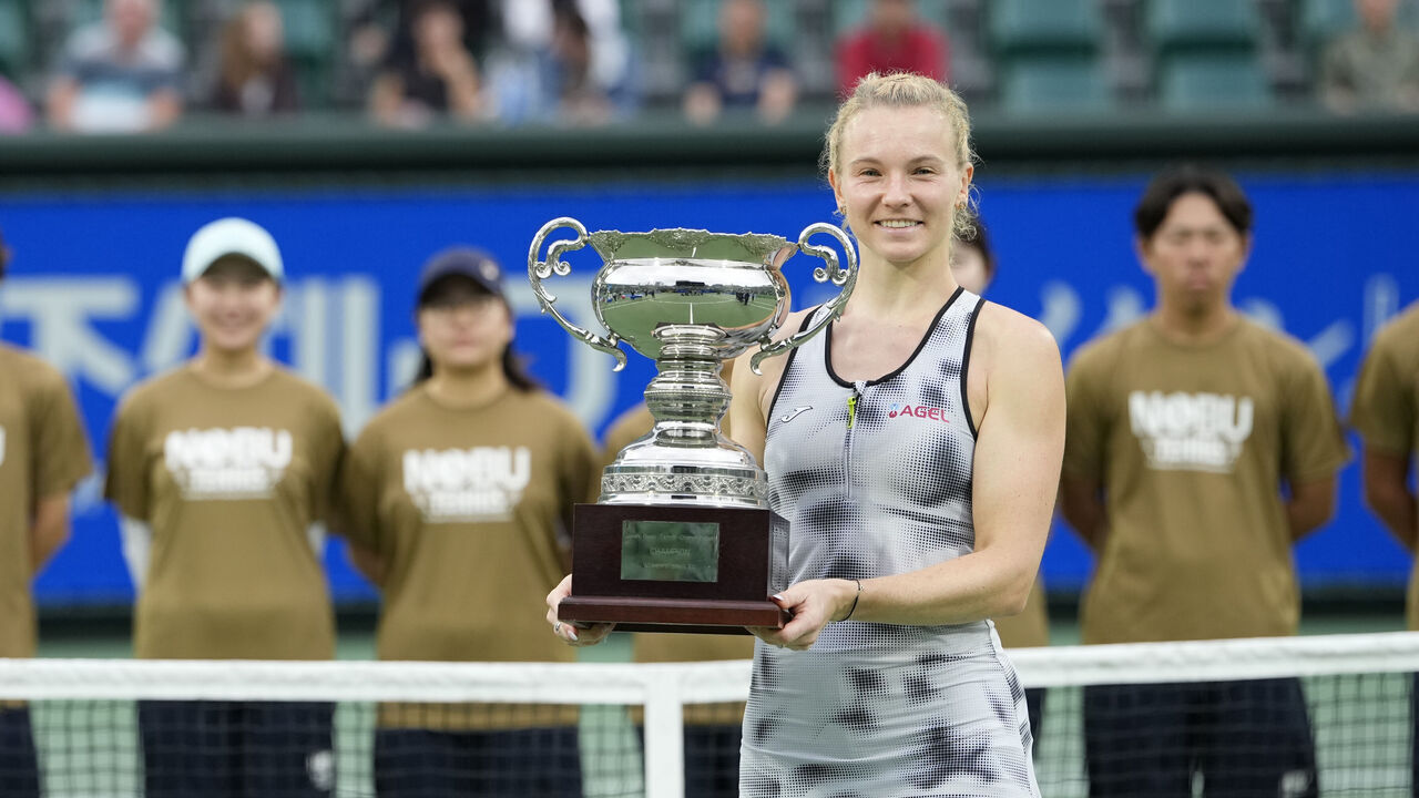 Katerina Siniakova of the Czech Republic poses with the winners' trophy after defeating Ashlyn Krueger of the United States in the Singles Final at the 2026 Kinoshita Group Japan Open Women's tennis tournament at Utsubo Tennis Center in Osaka, Japan, on October 25, 2026.