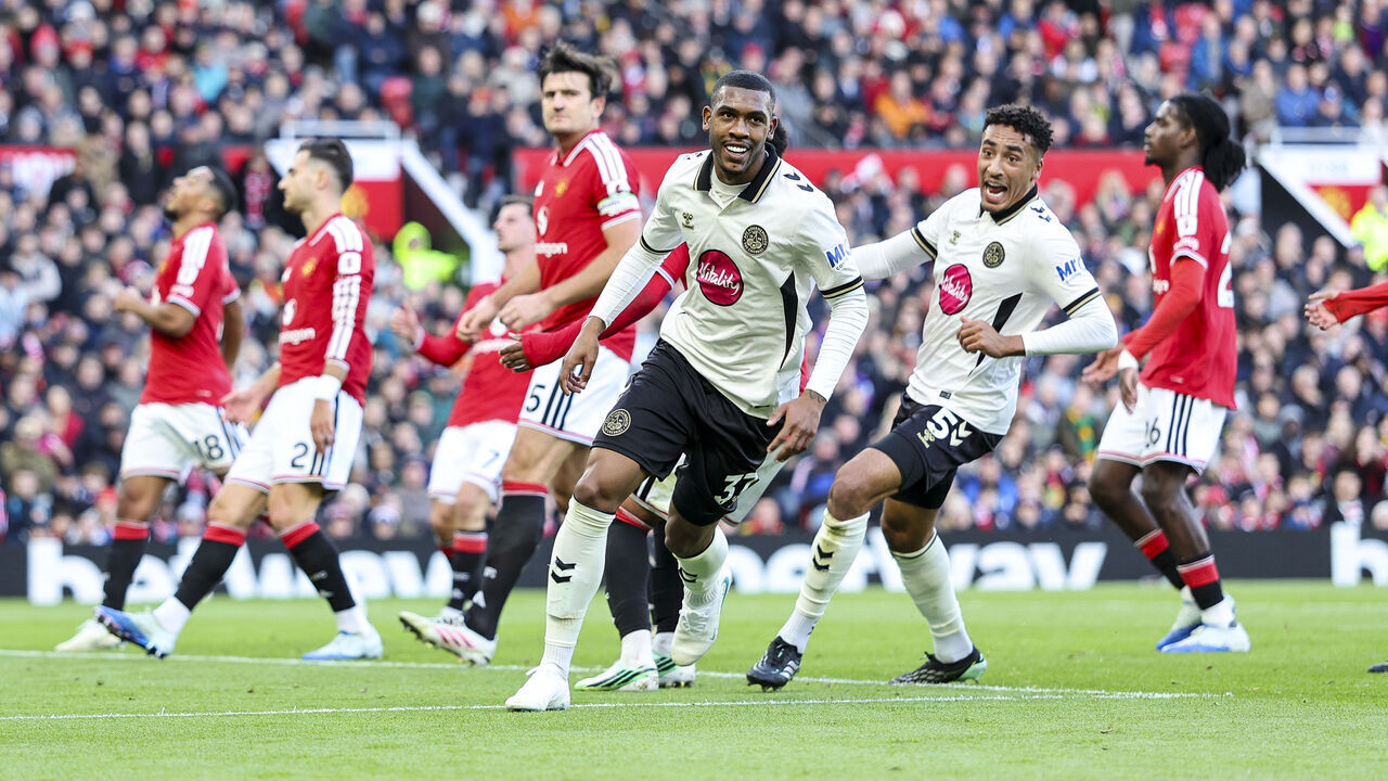 MANCHESTER, ENGLAND - OCTOBER 25: Goalscorer Rayan of Bournemouth celebrates after scoring to make it 1-0 with team-mate James Hill during the Premier League 2026/27 match between Manchester United and AFC Bournemouth at Old Trafford on October 25, 2026 in Manchester, England.