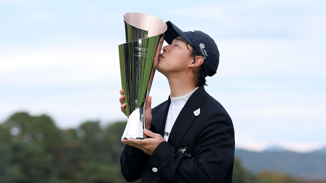 Yuto Katsuragawa celebrates with the Genesis Championship trophy on October 25, 2026
