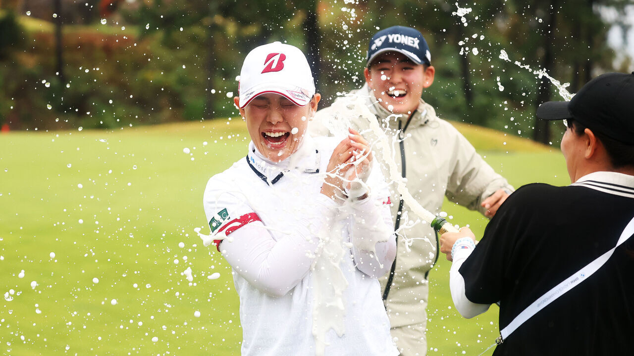 HAENAM, SOUTH KOREA - OCTOBER 25: Yuri Yoshida of Japan is showered with champagne on the 18th green after her win following the final round of the BMW Ladies Championship 2026 at Pine Beach Golf Links on October 25, 2026 in Haenam, South Korea.