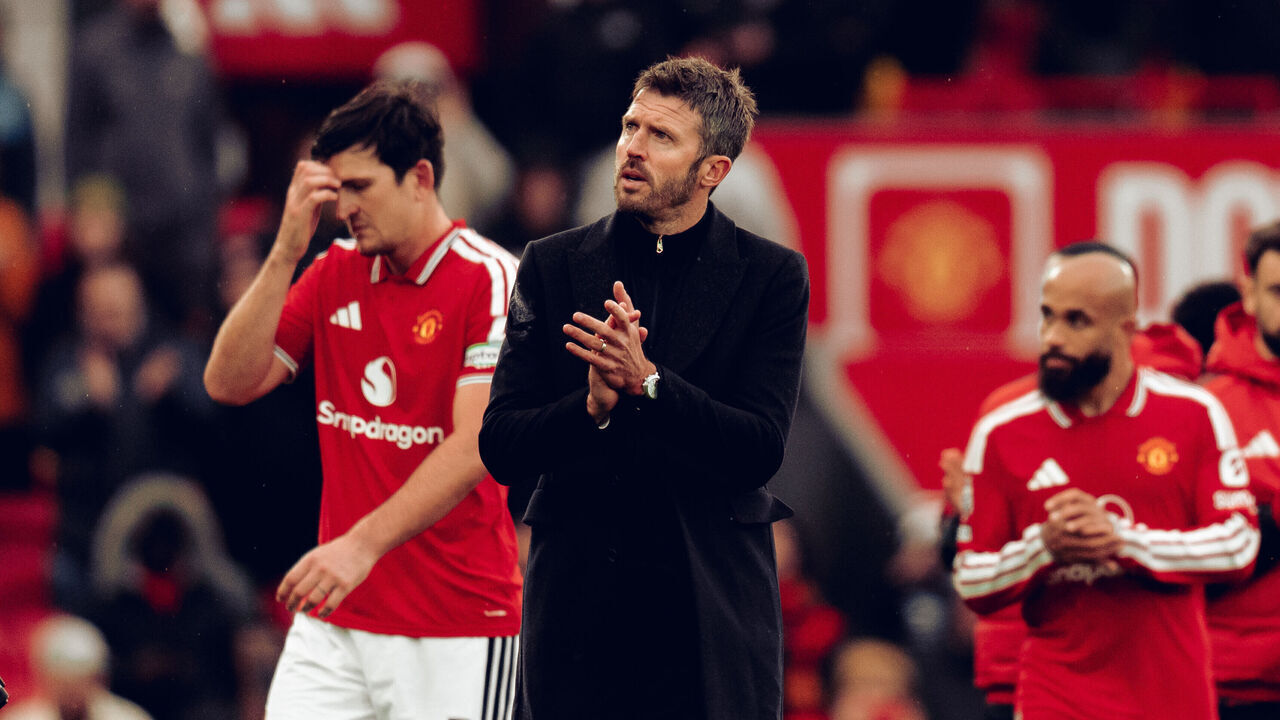 MANCHESTER, ENGLAND - OCTOBER 25: Head Coach Michael Carrick of Manchester United walks off after the Premier League 2026/27 match between Manchester United and AFC Bournemouth at Old Trafford on October 25, 2026 in Manchester, England.