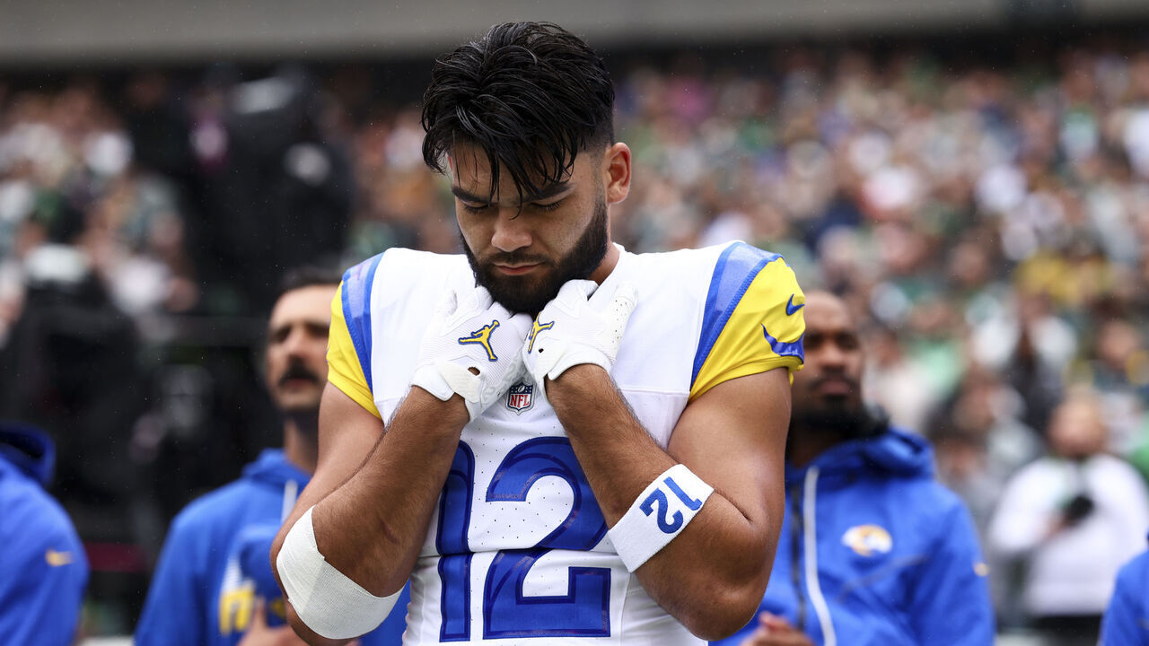 PHILADELPHIA, PENNSYLVANIA - OCTOBER 4: Puka Nacua #12 of the Los Angeles Rams stands on the sidelines during the national anthem prior to an NFL football game against the Philadelphia Eagles at Lincoln Financial Field on October 4, 2026 in Philadelphia, Pennsylvania.