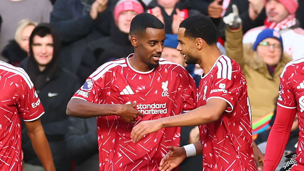 Liverpool's Swedish striker #09 Alexander Isak (L) celebrates with teammates after scoring their second goal during the English Premier League football match between Manchester United and Bournemouth at Old Trafford in Manchester, north west England, on October 25, 2026. / RESTRICTED TO EDITORIAL USE. No use with unauthorized audio, video, data, fixture lists, club/league logos or 'live' services. Online in-match use limited to 120 images. An additional 40 images may be used in extra time. No video emulation. Social media in-match use limited to 120 images. An additional 40 images may be used in extra time. No use in betting publications, games or single club/league/player publications. /
