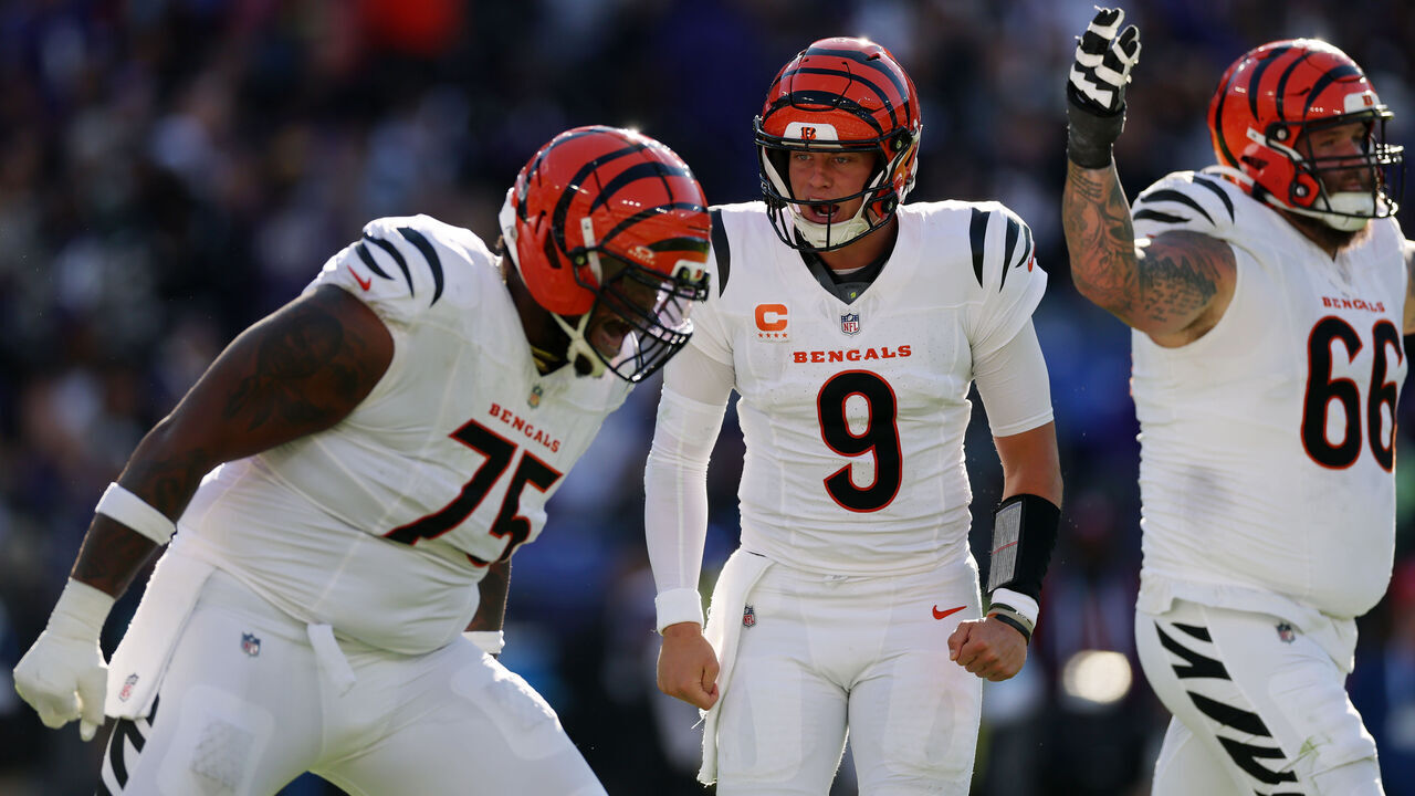 BALTIMORE, MARYLAND - OCTOBER 25: (L-R) Orlando Brown #75, Joe Burrow #9 and Dalton Risner #66 of the Cincinnati Bengals celebrate a touchdown against the Baltimore Ravens during the fourth quarter at M&T Bank Stadium on October 25, 2026 in Baltimore, Maryland.