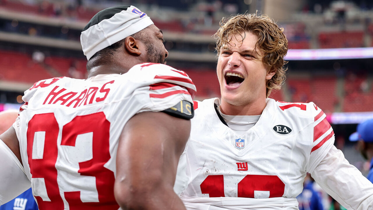 HOUSTON, TEXAS - OCTOBER 25: J.J. McCarthy #18 of the New York Giants celebrates after defeating the Houston Texans at Reliant Stadium on October 25, 2026 in Houston, Texas.