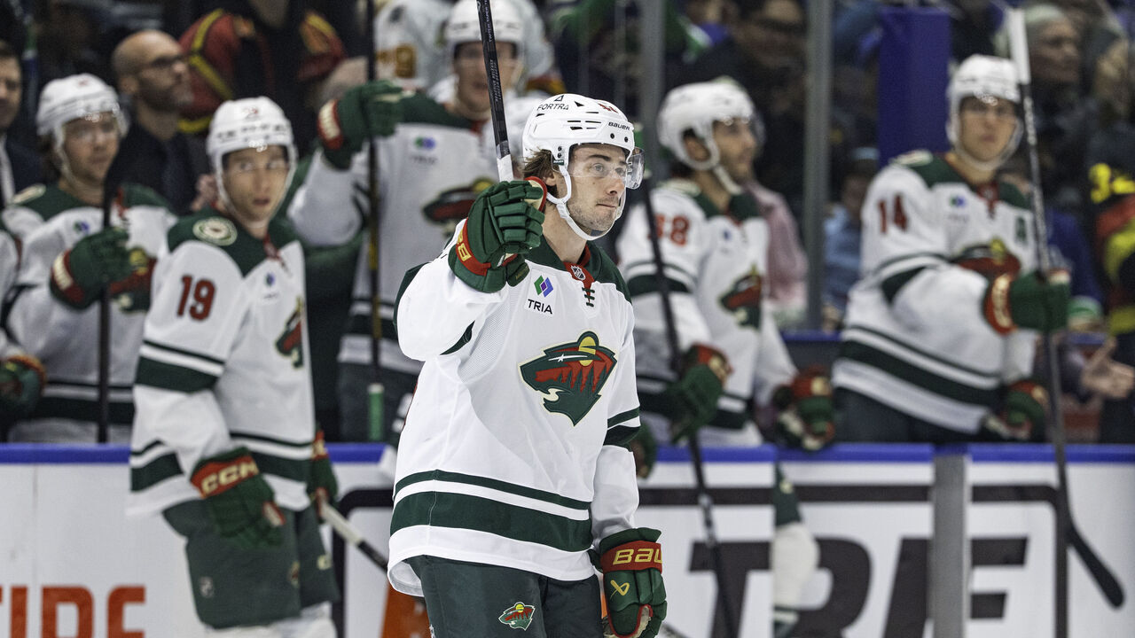 VANCOUVER, CANADA - OCTOBER 25: Quinn Hughes #43 of the Minnesota Wild reacts to his return video during the first period of their NHL game against the Vancouver Canucks at Rogers Arena on October 25, 2026 in Vancouver, British Columbia, Canada.