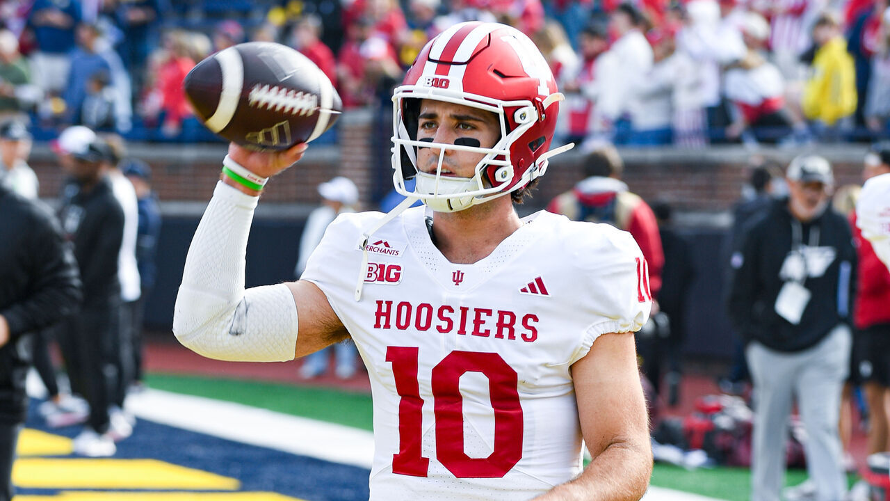 ANN ARBOR, MICHIGAN - OCTOBER 24: Josh Hoover #10 of the Indiana Hoosiers warms up before the start of a college football game against the Michigan Wolverines at Michigan Stadium on October 24, 2026 in Ann Arbor, Michigan. The Indiana Hoosiers won the game in overtime 13-6.