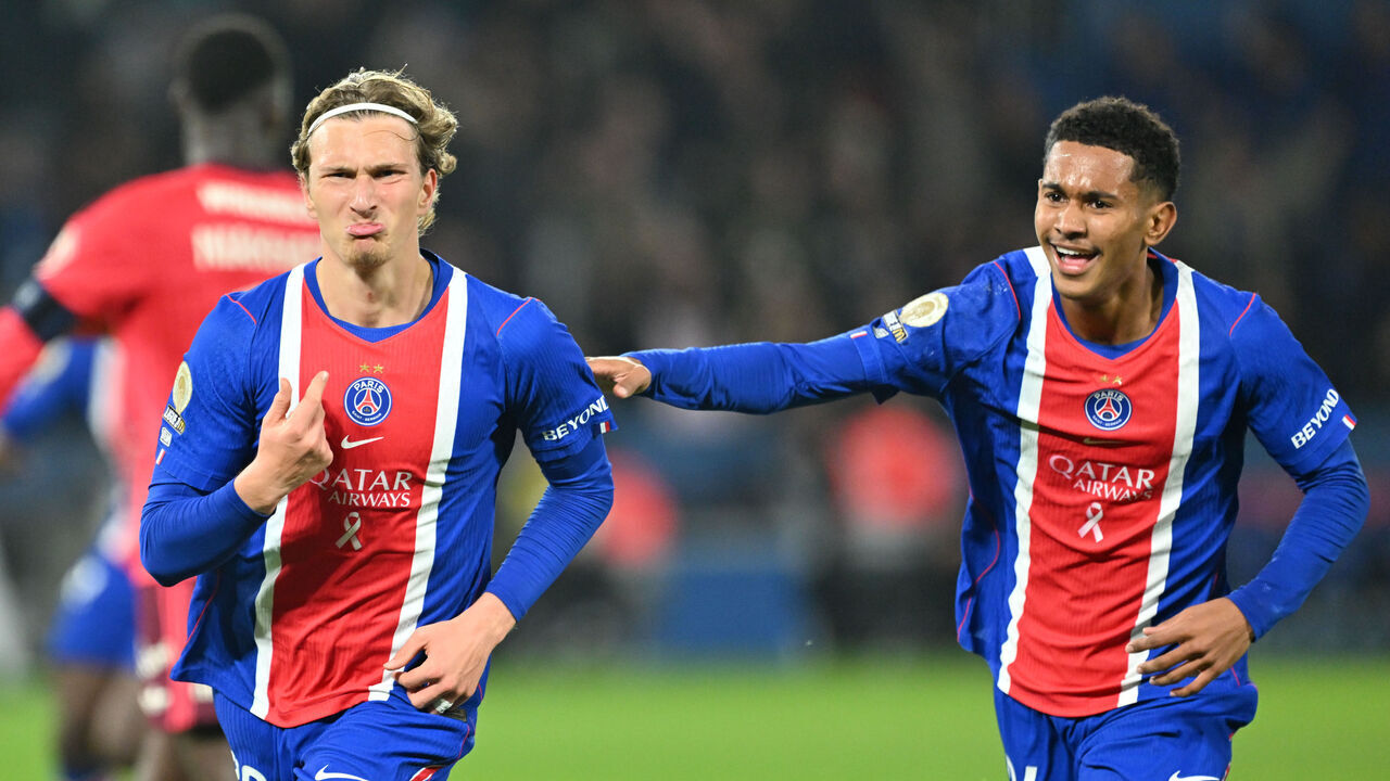 PARIS, FRANCE - OCTOBER 26: Mika Godts (L) of Paris Saint - Germain celebrates after scoring with Senny Mayulu (R) during the French Ligue 1 (L1) soccer match between Paris Saint-Germain (PSG) and Olympique Lyonnais (OL) at Parc des Princes stadium in Paris, France on October 26, 2026.