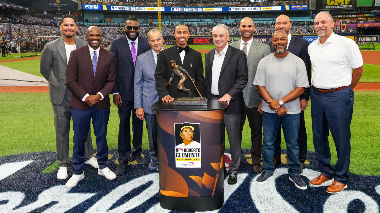 ST. PETERSBURG, FL - OCTOBER 26: 2026 Roberto Clemente Award recipient Francisco Lindor #12 of the New York Mets poses for a photo with MLB Commissioner Robert D. Manfred Jr. prior to Game Three of the 2026 World Series presented by Capital One between the Milwaukee Brewers and the Tampa Bay Rays at Tropicana Field on Monday, October 26, 2026 in St. Petersburg, Florida.