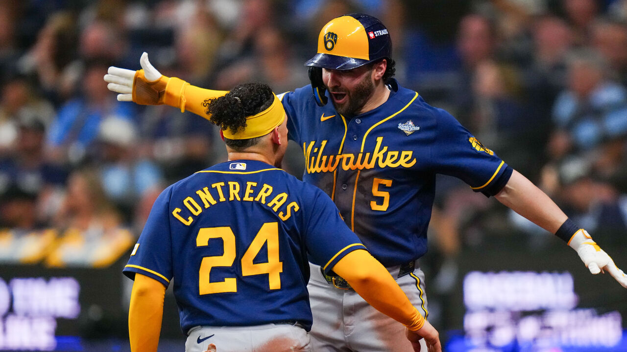 ST. PETERSBURG, FL - OCTOBER 26: Garrett Mitchell #5 of the Milwaukee Brewers celebrates with William Contreras #24 after scoring in the fifth inning during Game Three of the 2026 World Series presented by Capital One between the Milwaukee Brewers and the Tampa Bay Rays at Tropicana Field on Monday, October 26, 2026 in St. Petersburg, Florida.