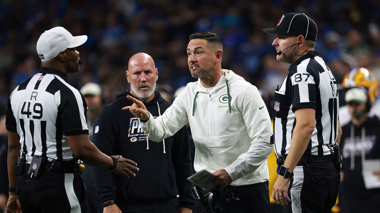 DETROIT,MICHIGAN-OCTOBER 25: Head coach Matt LaFleur of the Green Bay Packers talks to referee Alex Moore #49 during the second half of an NFL football game between the Green Bay Packers and the Detroit Lions in Detroit, Michigan USA, on Sunday, October 25, 2026