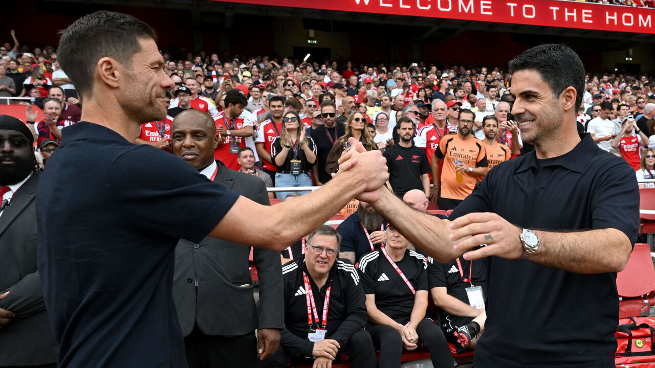 LONDON, ENGLAND - SEPTEMBER 06: Mikel Arteta, Manager of Arsenal, and Xabi Alonso, Manager of Chelsea, interact before the Premier League 2026/27 match between Arsenal FC and Chelsea FC at Emirates Stadium on September 06, 2026 in London, England.