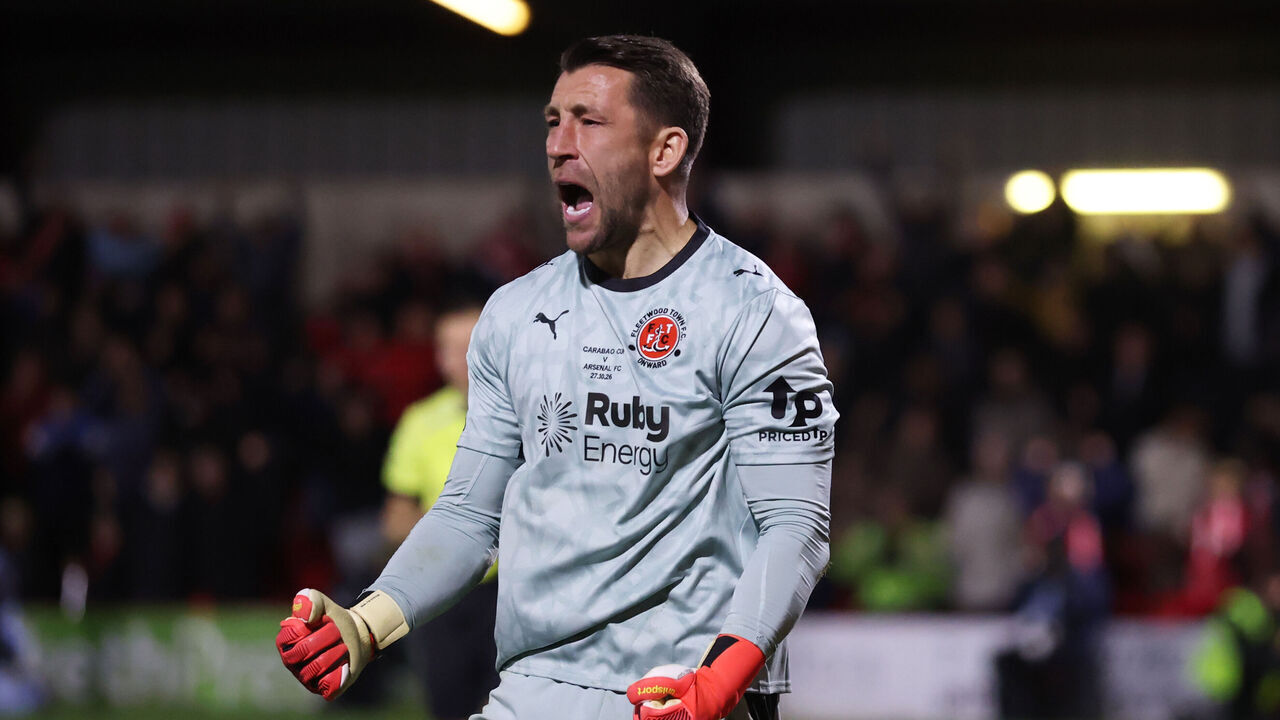 FLEETWOOD, ENGLAND - OCTOBER 27: Jay Lynch of Fleetwood Town celebrates saving Arsenal's fourth penalty taken by Bruno Guimaraes in the penalty shootout during the Carabao Cup Fourth Round match between Fleetwood Town and Arsenal at Highbury Stadium on October 27, 2026 in Fleetwood, England.