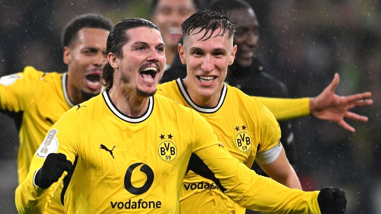 dpatop - 27 October 2026, North Rhine-Westphalia, Dortmund: Soccer, Men: DFB Cup, Borussia Dortmund vs. Werder Bremen, Second Round, Signal Iduna Park; Marcel Sabitzer (front, Borussia Dortmund) celebrates with his teammates after scoring the goal that made it 3-2. Photo: Fabian Strauch/dpa - IMPORTANT NOTICE: In accordance with the regulations of the Bundesliga and the DFB (German Football Association), it is prohibited to use or allow the use of photographs taken in the stadium and/or during the game in the form of sequential images and/or video-like photo sequences.