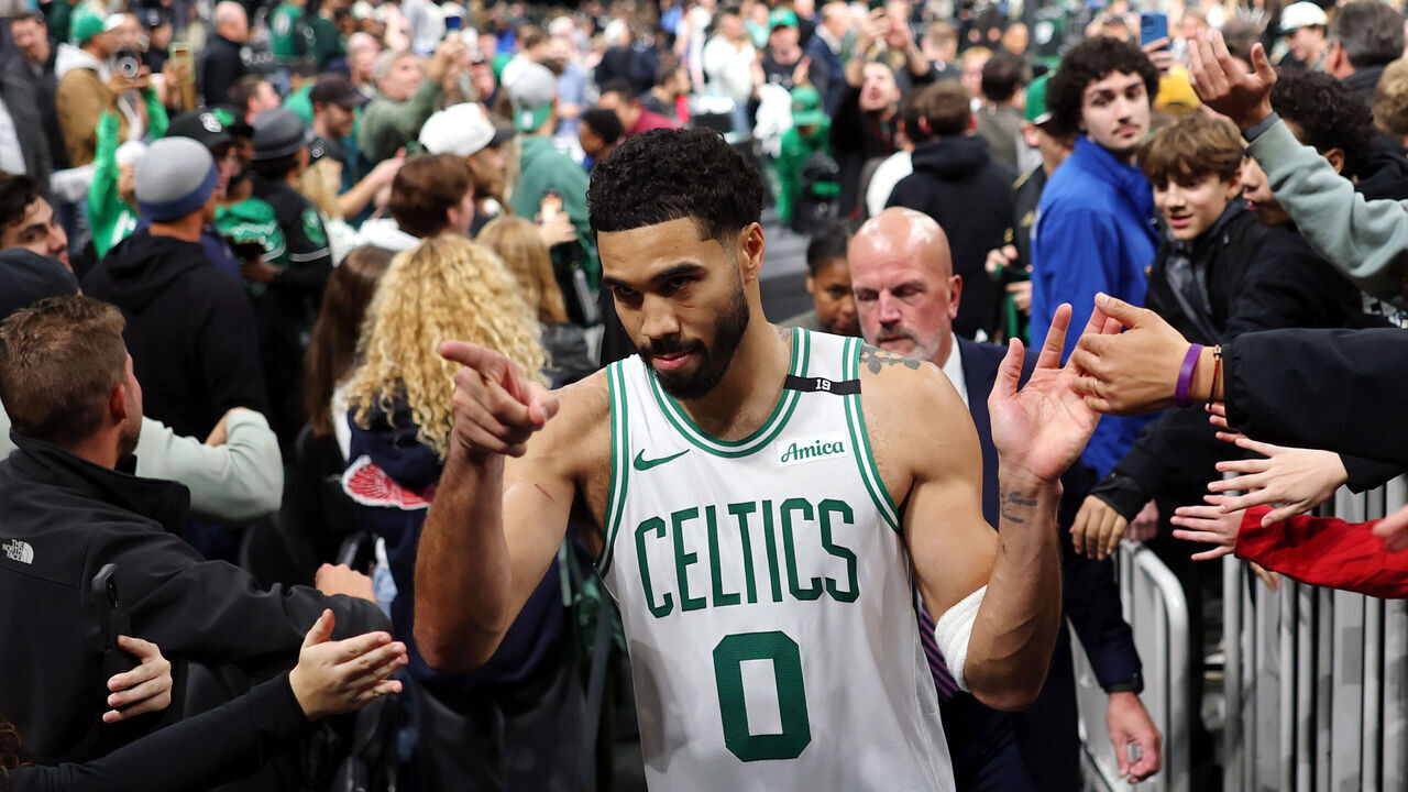BOSTON, MASSACHUSETTS - OCTOBER 27: Jayson Tatum #0 of the Boston Celtics celebrates with fans after scoring the game winning basket in overtime to defeat the Brooklyn Nets 125-124 at TD Garden on October 27, 2026 in Boston, Massachusetts.