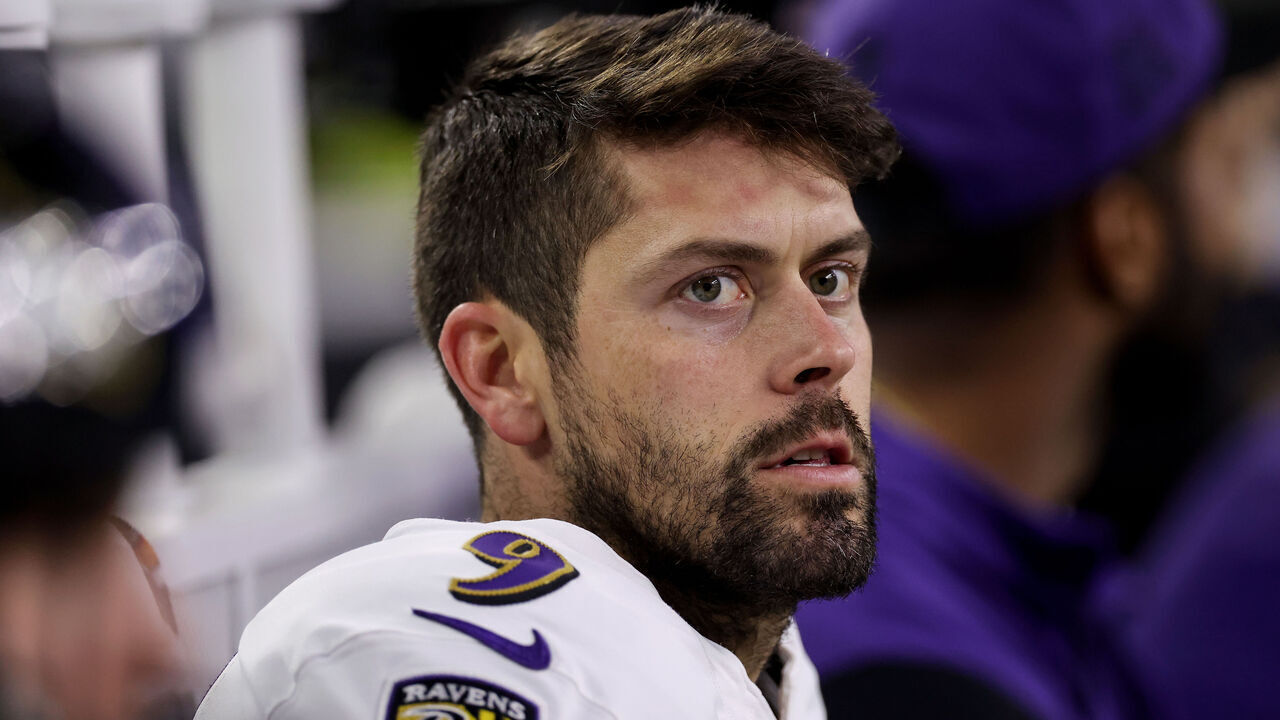 HOUSTON, TEXAS - DECEMBER 25: Justin Tucker #9 of the Baltimore Ravens sits on the bench in the second half against the Houston Texans at NRG Stadium on December 25, 2024 in Houston, Texas.