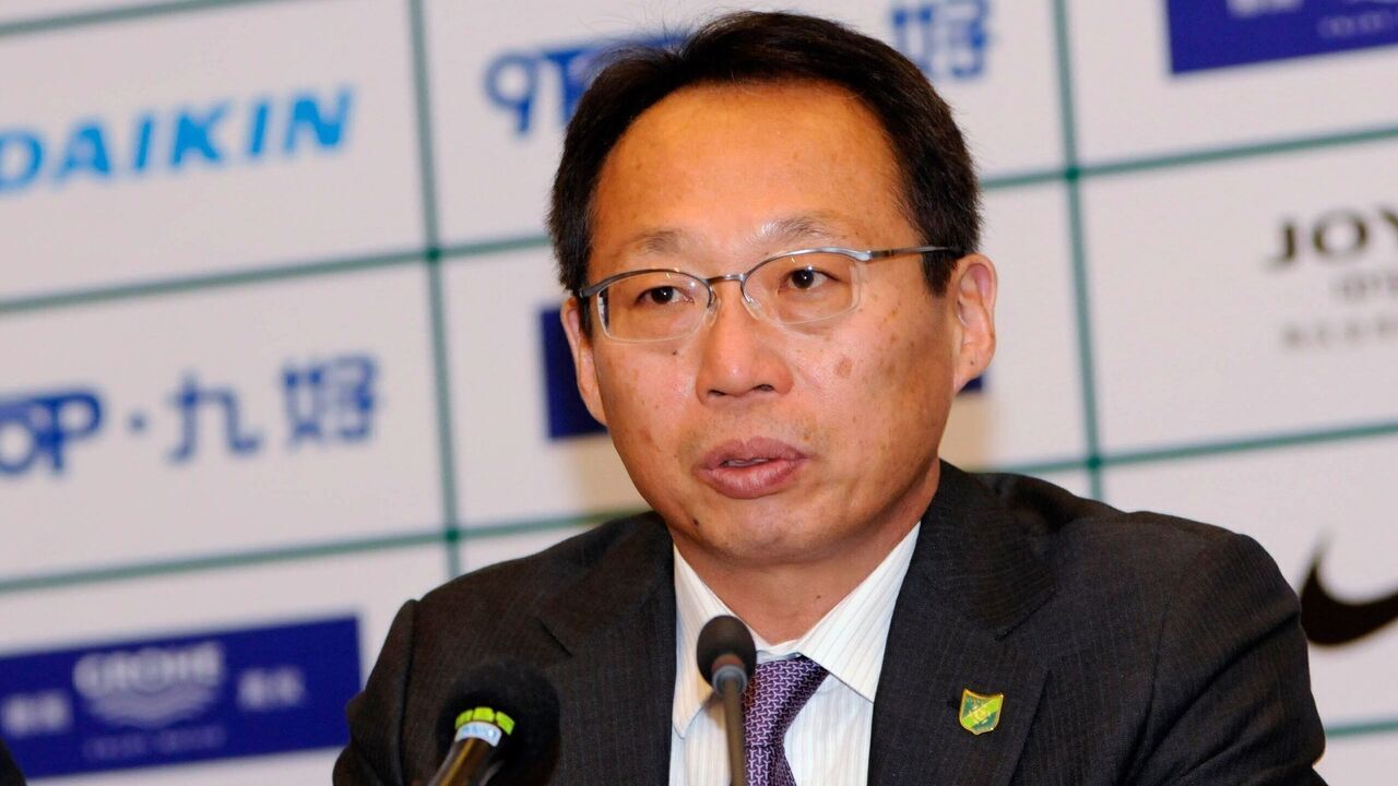 HANGZHOU, CHINA - DECEMBER 18: (CHINA OUT) Head coach Takeshi Okada of Hangzhou Greentown attends a signing ceremony on December 18, 2012 in Hangzhou, China. Takeshi Okada signed a two-year contract extension with Hangzhou Greentown.
