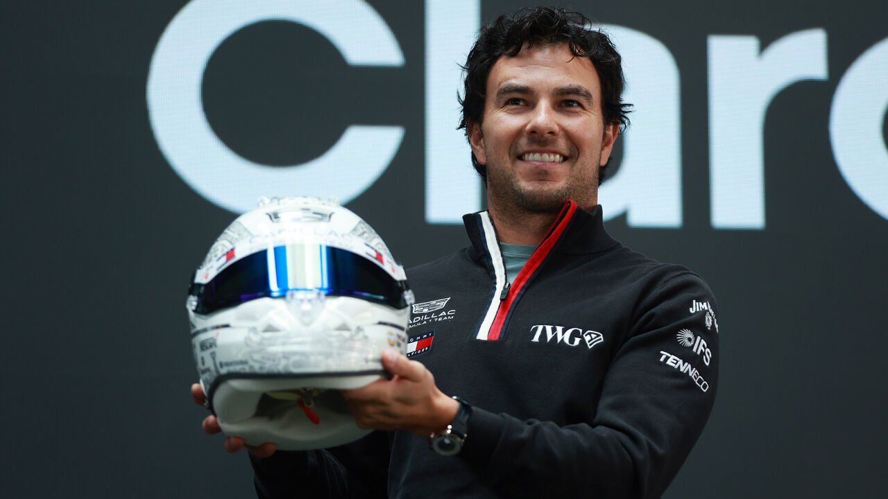 MEXICO CITY, MEXICO - OCTOBER 27: Mexican Formula 1 driver Sergio ''Checo'' Perez shows his special-edition helmet, commemorating his 300th Formula 1 Grand Prix, which he will wear at the Mexico City Grand Prix, at Teatro Telcel, in Mexico City, Mexico on October 27, 2026. Perez returns to his home Grand Prix for the first time as a driver for Cadillac Formula 1 Team, with the Mexico City Grand Prix marking his 300th Formula 1 Grand Prix start.
