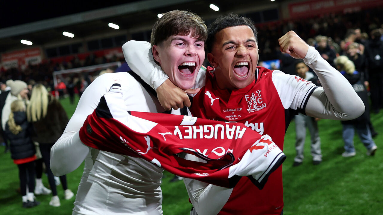 FLEETWOOD, ENGLAND - OCTOBER 27: Conor Haughey and Raffaele Cirino of Fleetwood Town celebrate after the team's victory in the Carabao Cup Fourth Round match between Fleetwood Town and Arsenal at Highbury Stadium on October 27, 2026 in Fleetwood, England.
