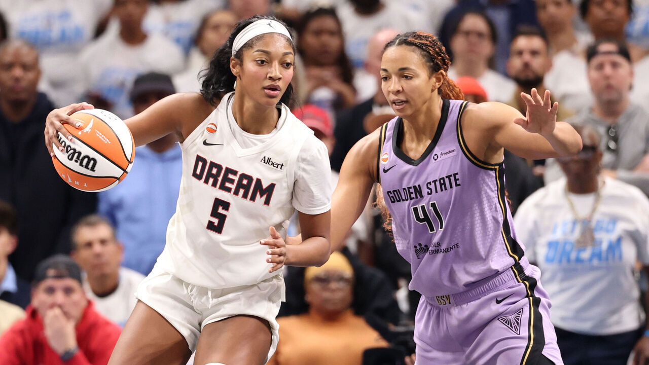 ATLANTA, GEORGIA - OCTOBER 24: Angel Reese #5 of the Atlanta Dream dribbles against Kiah Stokes #41 of the Golden State Valkyries during the fourth quarter in game four of the 2026 WNBA Finals at State Farm Arena on October 24, 2026 in Atlanta, Georgia.