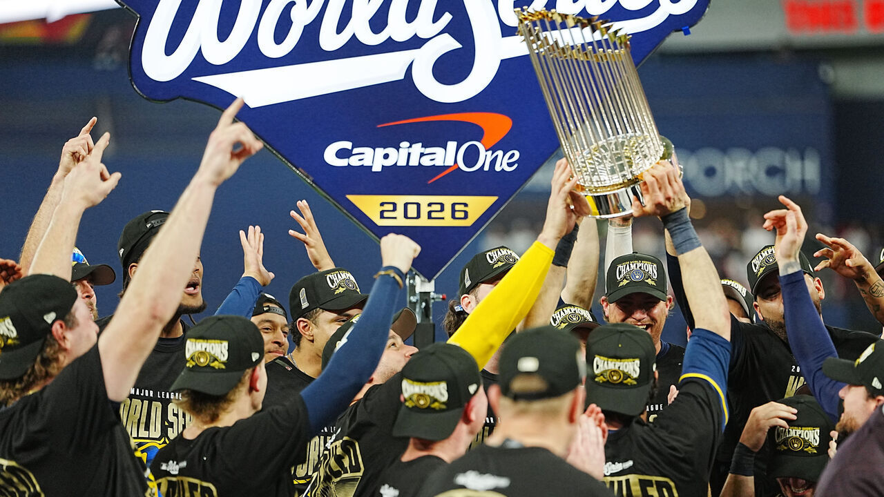 ST. PETERSBURG, FL - OCTOBER 28: Members of the Milwaukee Brewers celebrate as they lift The Commissioner's Trophy after Game Five of the 2026 World Series presented by Capital One between the Milwaukee Brewers and the Tampa Bay Rays at Tropicana Field on Wednesday, October 28, 2026 in St. Petersburg, Florida.