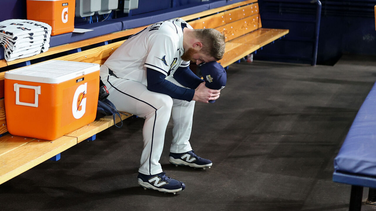 ST. PETERSBURG, FL - OCTOBER 28: Drew Rasmussen #57 of the Tampa Bay Rays sits in the dugout prior to Game Five of the 2026 World Series presented by Capital One between the Milwaukee Brewers and the Tampa Bay Rays at Tropicana Field on Wednesday, October 28, 2026 in St. Petersburg, Florida.