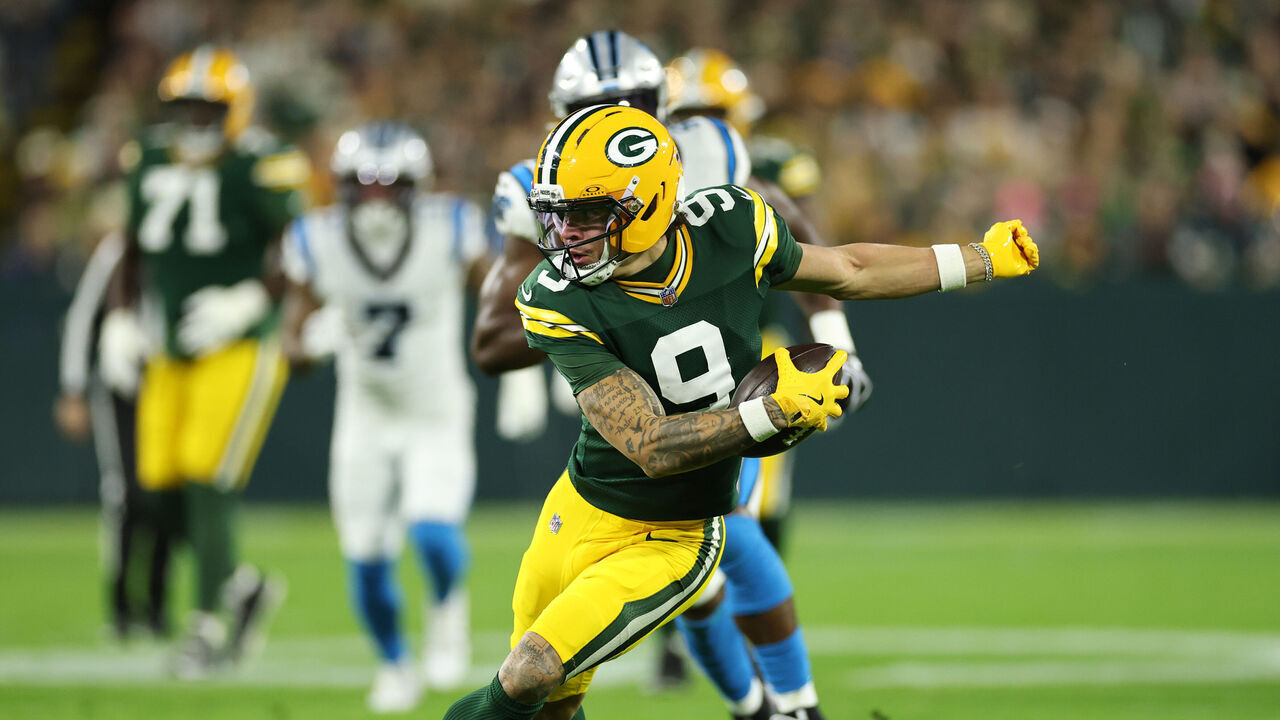 GREEN BAY, WISCONSIN - OCTOBER 29: Christian Watson #9 of the Green Bay Packers runs the ball after a catch against the Carolina Panthers during the first quarter at Lambeau Field on October 29, 2026 in Green Bay, Wisconsin.