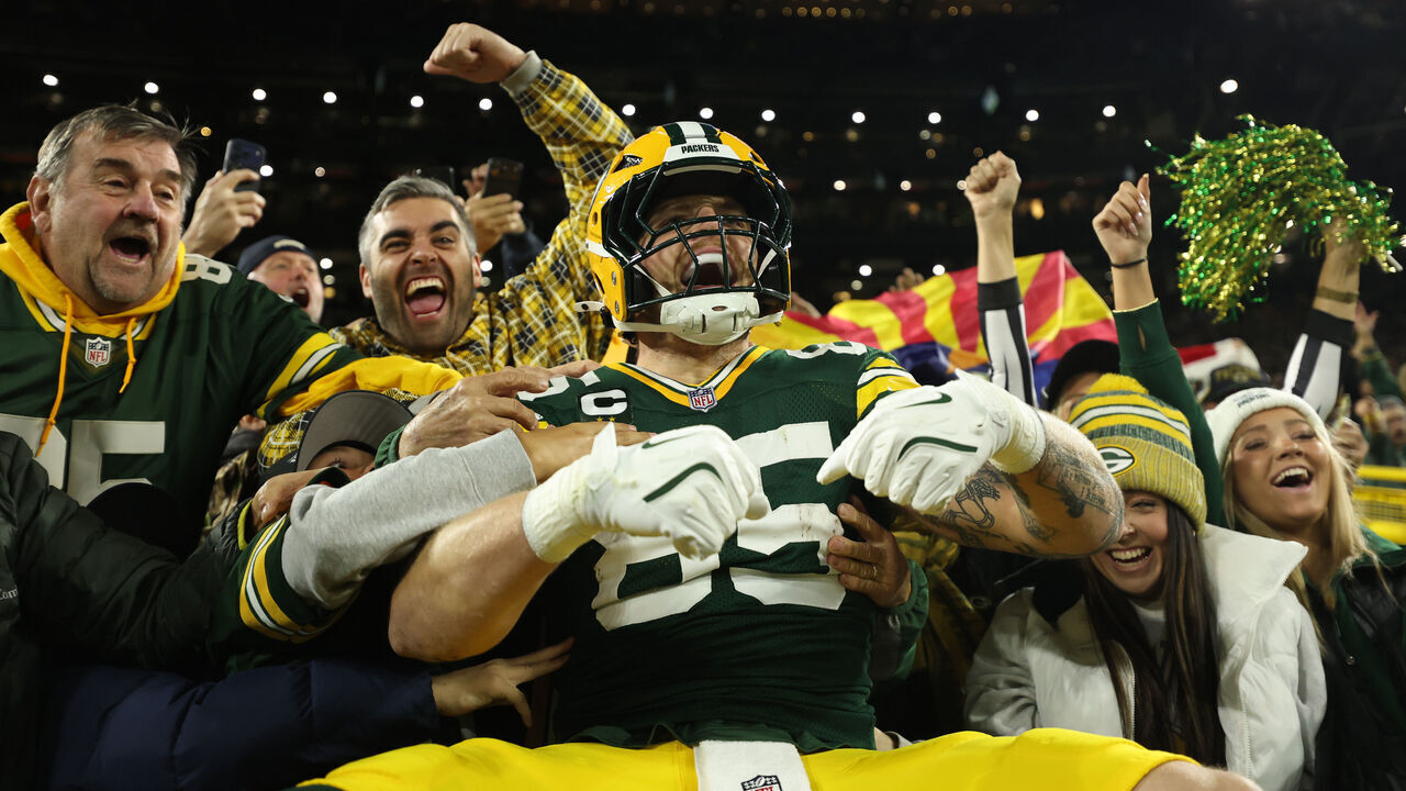 GREEN BAY, WISCONSIN - OCTOBER 29: Tucker Kraft #85 of the Green Bay Packers celebrates a touchdown with fans during the first quarter against the Carolina Panthers at Lambeau Field on October 29, 2026 in Green Bay, Wisconsin.