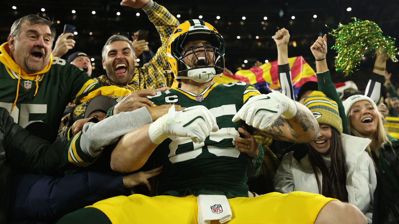 GREEN BAY, WISCONSIN - OCTOBER 29: Tucker Kraft #85 of the Green Bay Packers celebrates a touchdown with fans during the first quarter against the Carolina Panthers at Lambeau Field on October 29, 2026 in Green Bay, Wisconsin.