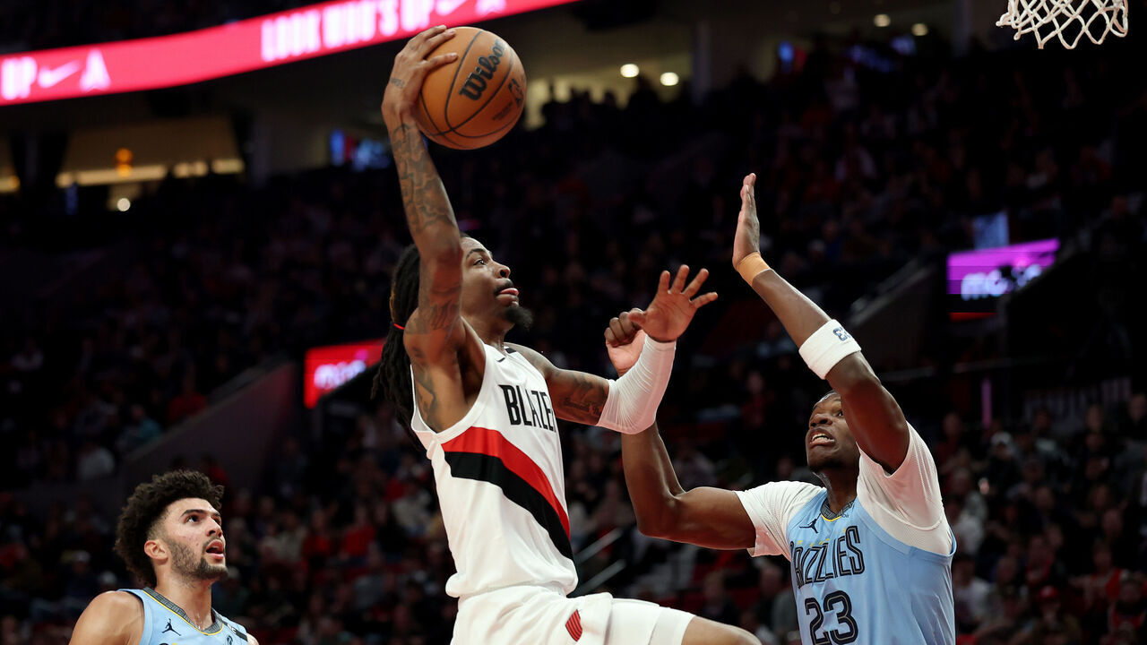 PORTLAND, OREGON - OCTOBER 29: Ja Morant #1 of the Portland Trail Blazers shoots against Cedric Coward #23 of the Memphis Grizzlies during the first half at Moda Center on October 29, 2026 in Portland, Oregon. NOTE TO USER: User expressly acknowledges and agrees that, by downloading and/or using this photograph, user is consenting to the terms and conditions of the Getty Images License Agreement.