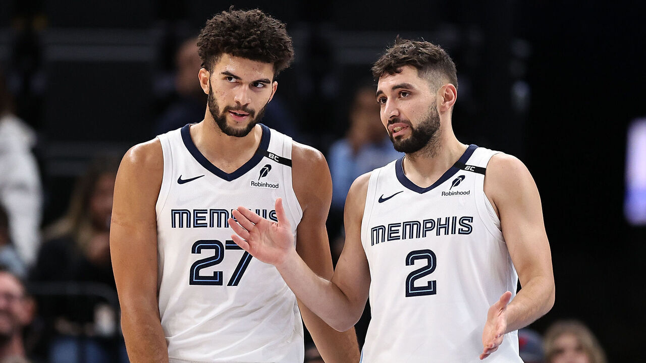 MEMPHIS, TENNESSEE - OCTOBER 16: Cameron Boozer #27 of the Memphis Grizzlies and Ty Jerome #2 of the Memphis Grizzlies talk during the first half during a 2026 preseason game at FedExForum on October 16, 2026 in Memphis, Tennessee.