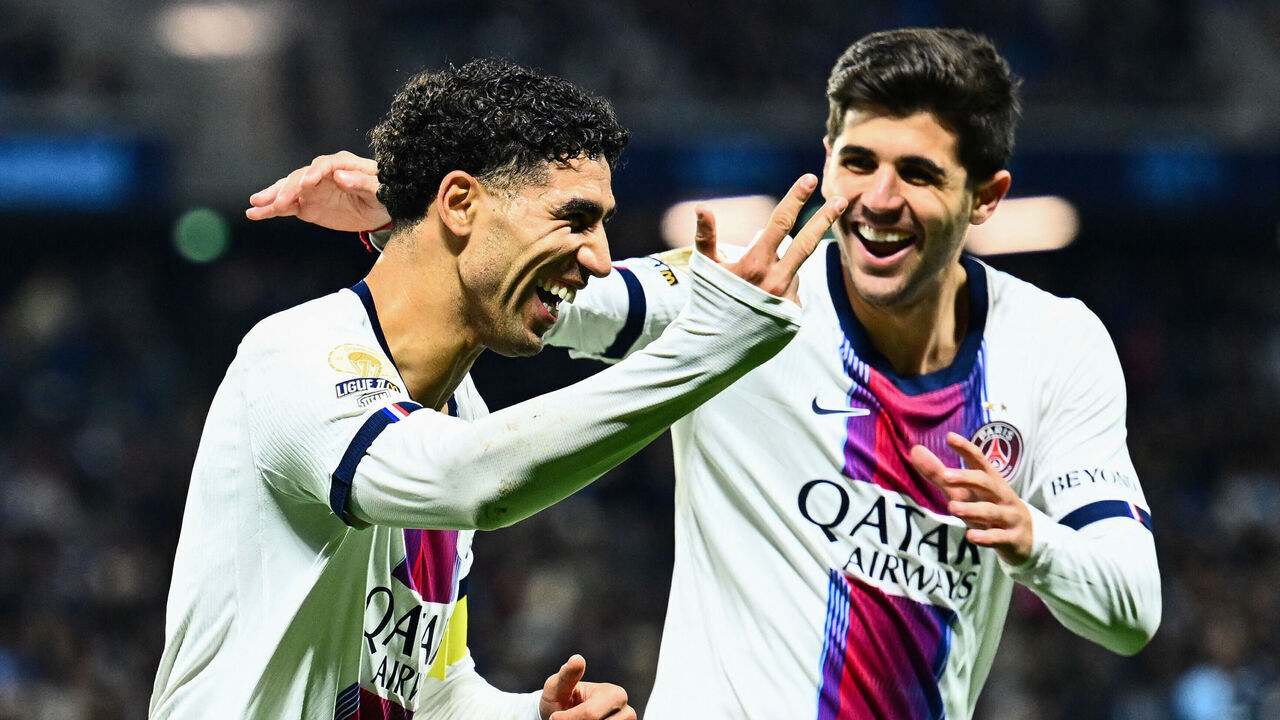 PSG's Moroccan defender #02 Achraf Hakimi (L) celebrates with PSG's Brazilian defender #04 Lucas Beraldo after scoring his team's fifth goal during the French L1 football match between Le Havre Athletic Club and Paris Saint-Germain (PSG) at Stade Oceane in Le Havre, north-western France on October 30, 2026.