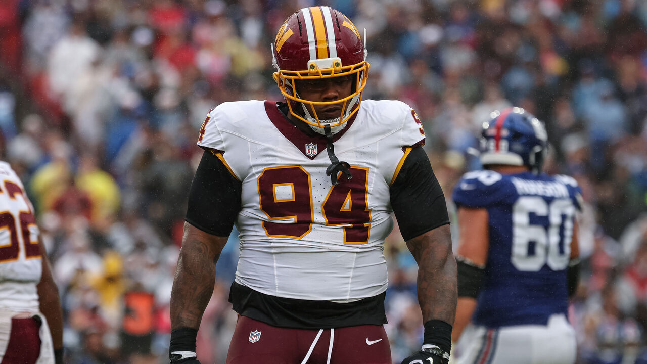 LANDOVER, MARYLAND - OCTOBER 11: Daron Payne #94 of the Washington Commanders reacts during the first half of the NFL game against the New York Giants at Northwest Stadium on October 11, 2026 in Landover, Maryland.