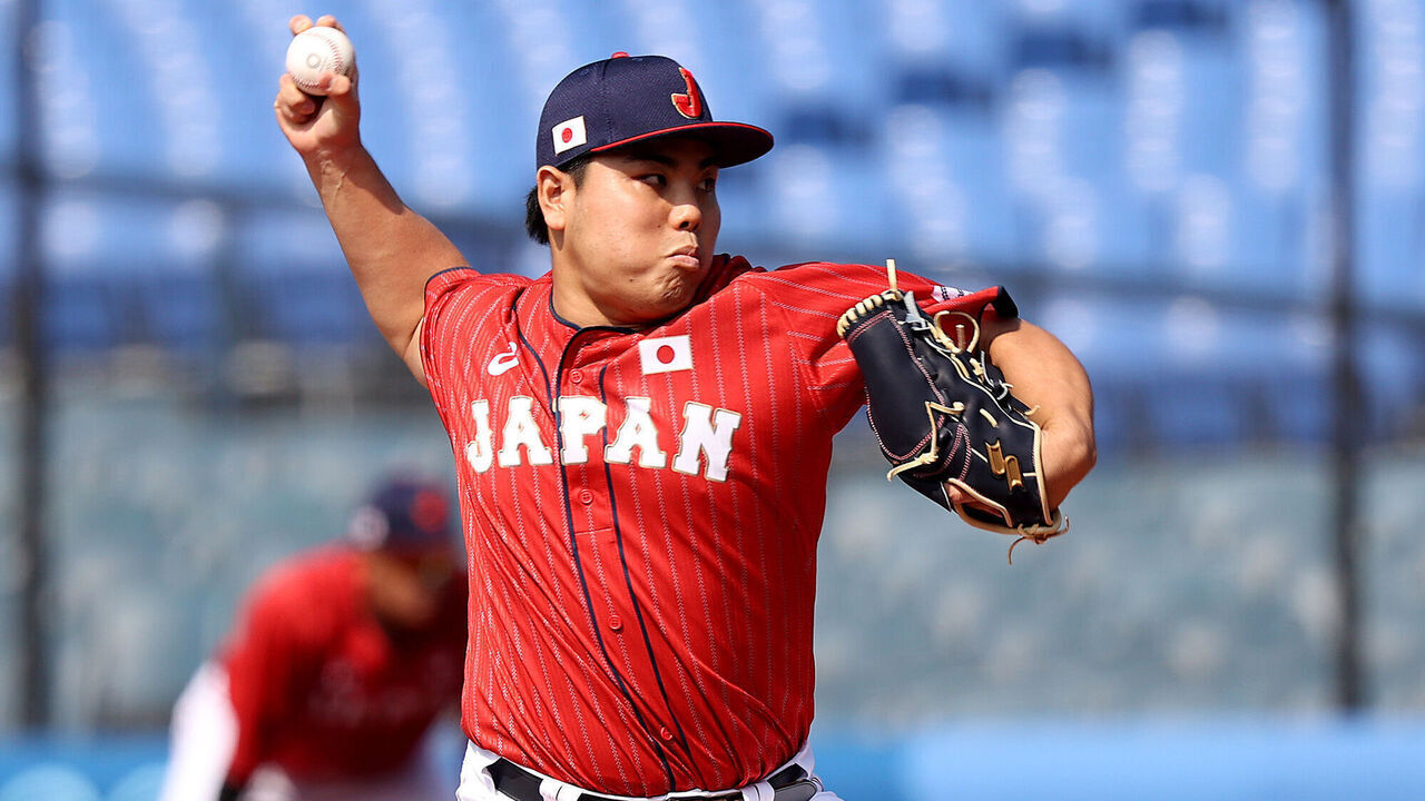 YOKOHAMA, JAPAN - JULY 31: Relief pitcher Kaima Taira #61 of Team Japan pitches in the eighth inning against Team Mexico during the baseball opening round Group A game on day eight of the Tokyo 2020 Olympic Games at Yokohama Baseball Stadium on July 31, 2021 in Yokohama, Kanagawa, Japan.
