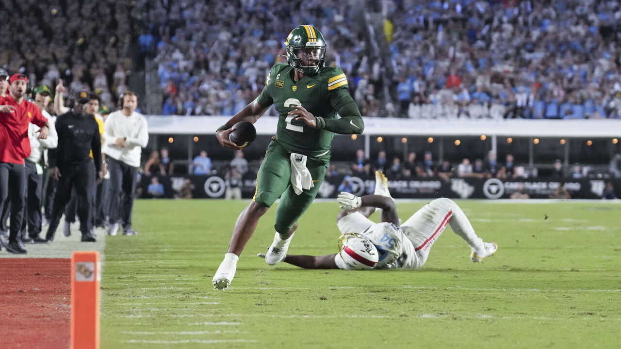 ORLAND, FL - OCTOBER 30: Baylor Bears quarterback DJ Lagway (2) rushes with the ball in the first half during the college football game between the Baylor Bears and the UCF Citronauts on Friday, October 30, 2026 at Acrisure Bounce House in Orlando, FL