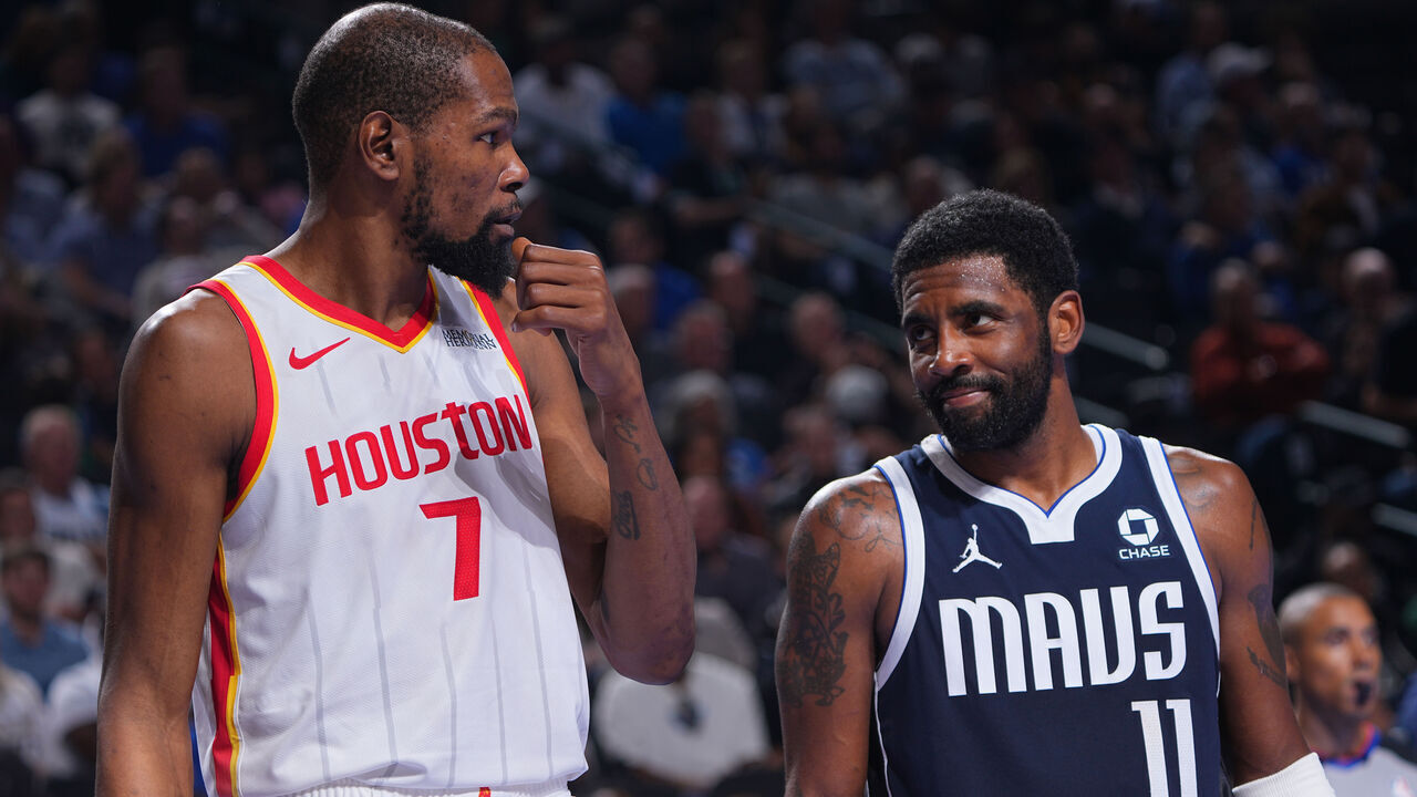 DALLAS, TX - OCTOBER 30: Kevin Durant #7 of the Houston Rockets and Kyrie Irving #11 of the Dallas Mavericks looks on during the game during the Emirates NBA Cup on October 30, 2026 at American Airlines Center in Dallas, Texas. Mandatory Copyright Notice: Copyright 2026 NBAE