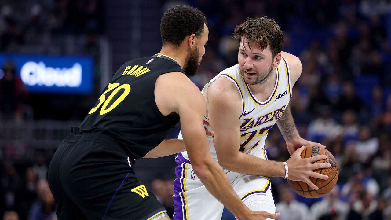 SAN FRANCISCO, CALIFORNIA - OCTOBER 30: Luka Doncic #77 of the Los Angeles Lakers is guarded by Stephen Curry #30 of the Golden State Warriors during the first half at Chase Center on October 30, 2026 in San Francisco, California. NOTE TO USER: User expressly acknowledges and agrees that, by downloading and/or using this photograph, user is consenting to the terms and conditions of the Getty Images License Agreement.
