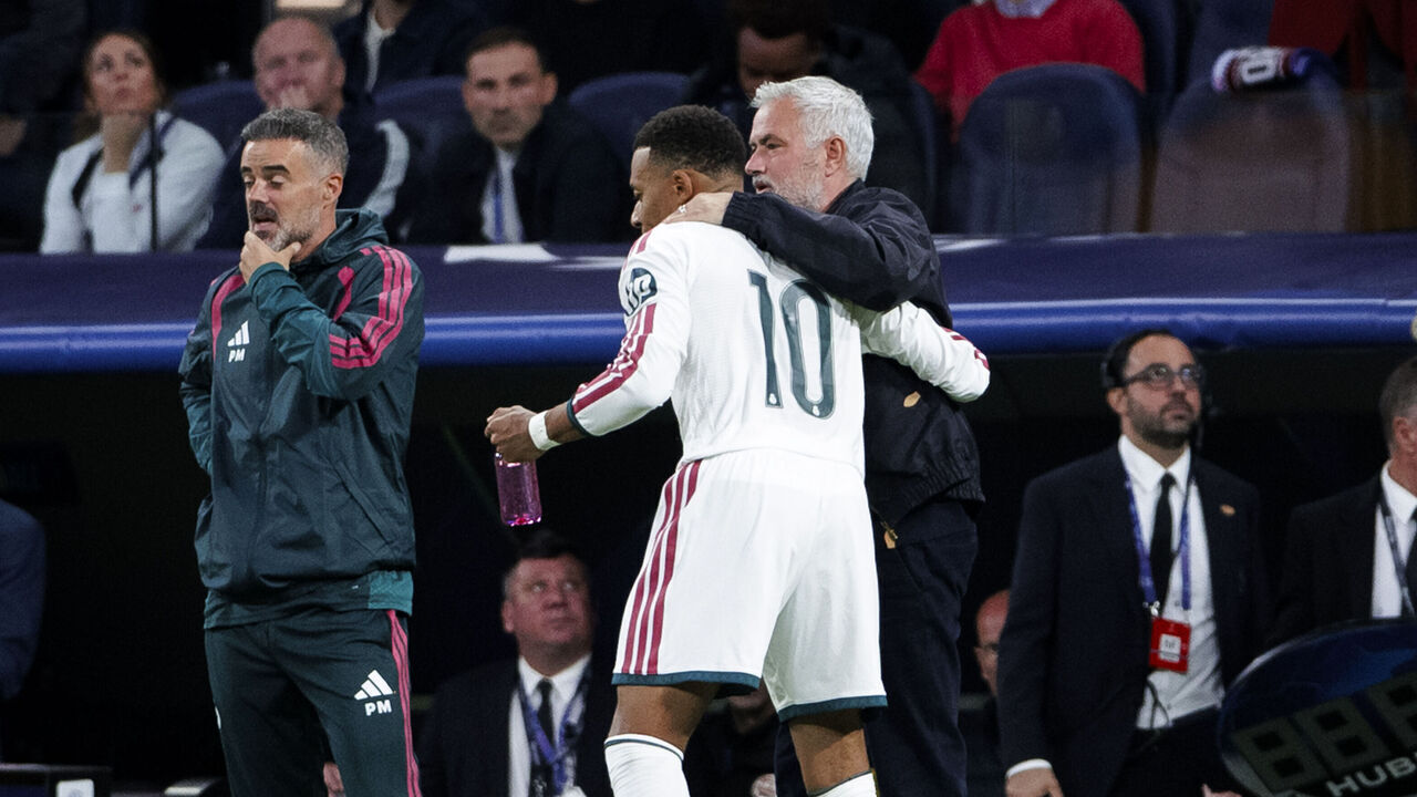 Kylian Mbappe of Real Madrid and head coach Jose Mourinho celebrate a goal during the UEFA Champions League 2026/27 match between Real Madrid and RB Leipzig at Santiago Bernabeu Stadium in Madrid, Spain, on October 21, 2026.