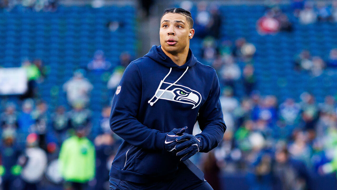 SEATTLE, WASHINGTON - JANUARY 17: Zach Charbonnet #26 of the Seattle Seahawks warms up prior to an NFL divisional playoff football game against the San Francisco 49ers at Lumen Field on January 17, 2026 in Seattle, Washington.