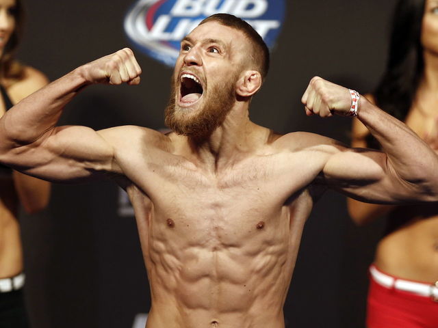 Conor McGregor: 'I am now the world champion. ... Jose Aldo went running'