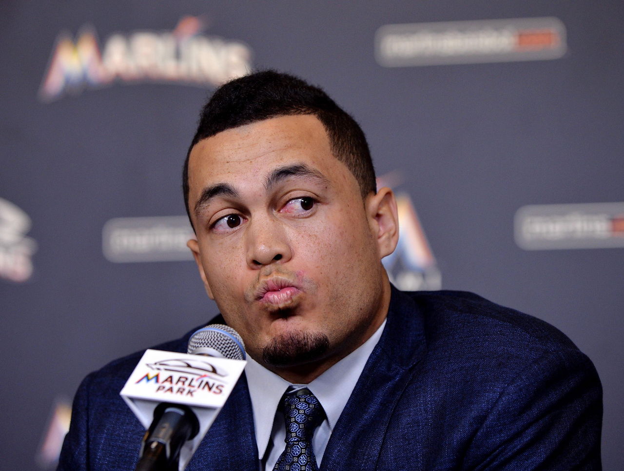 Miami Marlins' Giancarlo Stanton eats Kit Kats unusually - Sports  Illustrated