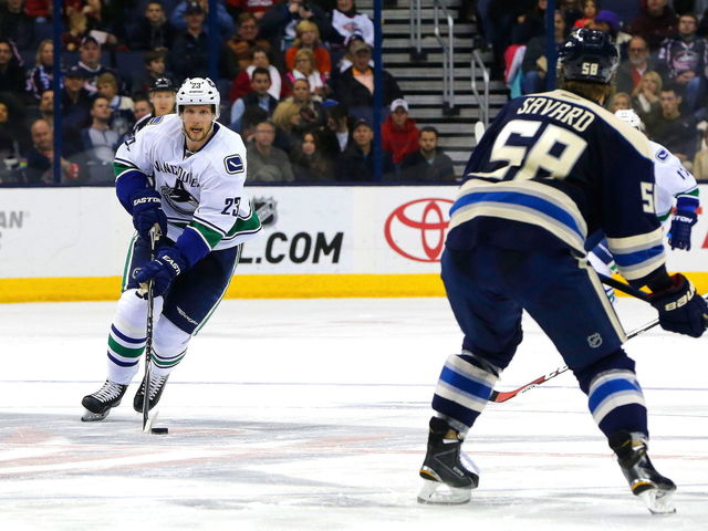 Canucks' Edler won't return vs. Flames after suffering upper-body injury