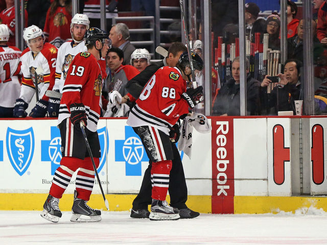 VIDEO: Blackhawks' Kane forced from game after being cross-checked into boards